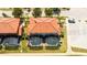 Aerial view of two townhouses with pools at 491 Las Fuentes Dr, Kissimmee, FL 34746