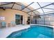 Relaxing pool area with patio furniture and grill at 491 Las Fuentes Dr, Kissimmee, FL 34746