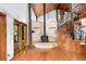 Fireplace in open living area with hardwood floors at 1205 Sutton Trl, Geneva, FL 32732