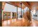 Open living room showcasing a wood burning stove and high ceilings at 1205 Sutton Trl, Geneva, FL 32732
