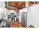 Modern kitchen with white cabinets and granite countertops at 1205 Sutton Trl, Geneva, FL 32732