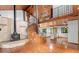 Living room with fireplace, spiral staircase and high ceilings at 1205 Sutton Trl, Geneva, FL 32732