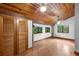 Bright bedroom with wood floors and large windows at 1205 Sutton Trl, Geneva, FL 32732