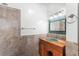 Bathroom with unique sink and wood vanity at 1205 Sutton Trl, Geneva, FL 32732