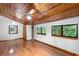 Spacious bedroom with wood floors and a view of nature at 1205 Sutton Trl, Geneva, FL 32732