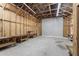 Workshop with roll-up door and plenty of storage space at 1205 Sutton Trl, Geneva, FL 32732