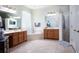 Large bathroom with double vanity, soaking tub, and walk-in shower at 2907 Ponkan Meadow Dr, Apopka, FL 32712