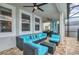 Outdoor patio furniture and ceiling fan at 1870 Sawyer Palm Pl, Kissimmee, FL 34747