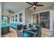 Outdoor patio with dining table and seating area at 1870 Sawyer Palm Pl, Kissimmee, FL 34747