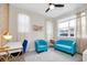 Home office with a desk, chairs, and large window at 1870 Sawyer Palm Pl, Kissimmee, FL 34747