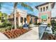 Community center with welcoming entrance and landscaping at 1870 Sawyer Palm Pl, Kissimmee, FL 34747