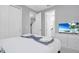 Bright bedroom with a comfortable bed and en-suite bathroom at 1870 Sawyer Palm Pl, Kissimmee, FL 34747