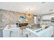 Open living room with modern furniture and kitchen view at 1870 Sawyer Palm Pl, Kissimmee, FL 34747