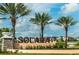 Solara community entrance with landscaping and signage at 1870 Sawyer Palm Pl, Kissimmee, FL 34747
