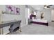 Main bedroom with desk and purple accents at 1870 Sawyer Palm Pl, Kissimmee, FL 34747