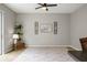 Spacious living room with large window and neutral decor at 2663 River Landing Dr, Sanford, FL 32771