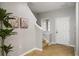 Bright and airy entryway with staircase and neutral wall colors at 2663 River Landing Dr, Sanford, FL 32771