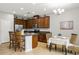 Modern kitchen with dark countertops and stainless steel appliances at 2663 River Landing Dr, Sanford, FL 32771