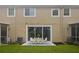 Private patio with table and chairs, perfect for outdoor dining at 2663 River Landing Dr, Sanford, FL 32771