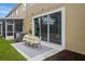 Patio with table and chairs; screened porch at 2663 River Landing Dr, Sanford, FL 32771