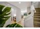 Bright and spacious entryway with view to kitchen and stairs at 2663 River Landing Dr, Sanford, FL 32771
