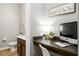 Convenient home office with built-in desk and half bathroom at 2663 River Landing Dr, Sanford, FL 32771