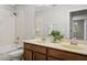 Bathroom with double vanity and shower/tub combo at 2663 River Landing Dr, Sanford, FL 32771