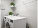 Laundry room with washer, dryer, and shelving at 2663 River Landing Dr, Sanford, FL 32771