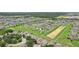 Wide aerial view of neighborhood and surrounding area at 475 Windsor Pl, Davenport, FL 33896
