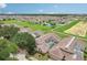 Aerial view of neighborhood with community pool at 475 Windsor Pl, Davenport, FL 33896