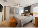 Main bedroom with large closet and ceiling fan at 318 Stone Castle Loop, Lady Lake, FL 32159