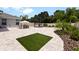 Large backyard patio with artificial turf, gazebo, and trampoline at 318 Stone Castle Loop, Lady Lake, FL 32159
