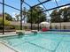Refreshing pool with water features and plenty of space for relaxation at 318 Stone Castle Loop, Lady Lake, FL 32159