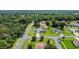 Aerial view of a house and neighborhood, showcasing surrounding homes at 318 Stone Castle Loop, Lady Lake, FL 32159