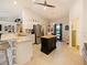 Bright kitchen with an island, breakfast nook, and stainless steel appliances at 318 Stone Castle Loop, Lady Lake, FL 32159