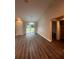 Bright dining room with hardwood floors and sliding glass doors at 12202 Se 87Th Ct, Belleview, FL 34420