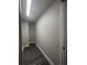 Walk-in closet with wire shelving and vinyl flooring at 12202 Se 87Th Ct, Belleview, FL 34420