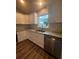 Modern kitchen with stainless steel appliances and granite countertops at 12202 Se 87Th Ct, Belleview, FL 34420