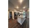 Modern kitchen with stainless steel appliances and granite countertops at 12202 Se 87Th Ct, Belleview, FL 34420