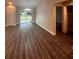 Bright dining room with hardwood floors and sliding glass doors at 12202 Se 87Th Ct, Belleview, FL 34420