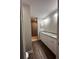 Bathroom with double vanity, granite countertop, and large shower at 12202 Se 87Th Ct, Belleview, FL 34420