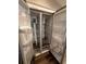 Interior view of a stainless steel refrigerator at 12202 Se 87Th Ct, Belleview, FL 34420
