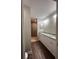 Bathroom with double vanity, granite countertop, and large shower at 12202 Se 87Th Ct, Belleview, FL 34420