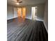 Large main bedroom with access to the bathroom and closet at 12202 Se 87Th Ct, Belleview, FL 34420