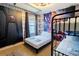 bedroom with full-size bed and bunk beds, featuring a Marvel theme at 6047 Broad Oak Dr, Davenport, FL 33837