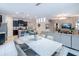 Open concept dining area with kitchen and living room views at 6047 Broad Oak Dr, Davenport, FL 33837