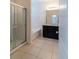 Bathroom with shower, tub, granite countertops, and double sinks at 6047 Broad Oak Dr, Davenport, FL 33837