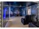 Home theater with Star Wars themed walls and reclining seats at 6047 Broad Oak Dr, Davenport, FL 33837
