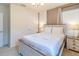 Bedroom with a queen-size bed and light wood frame at 6047 Broad Oak Dr, Davenport, FL 33837