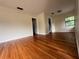 Spacious bedroom with hardwood floors and ample light at 1639 Silver Star Rd, Orlando, FL 32804